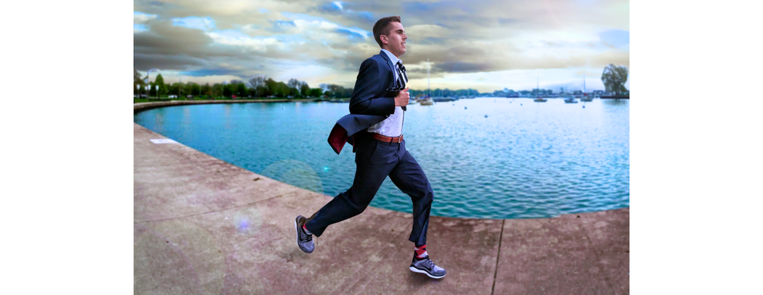 Man running in a suit
